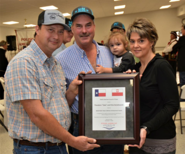 Family accepting the 2018 Polish Texas Lifetime Achievement Award for the Kwiatkowski Brothers